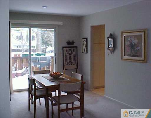 22 Chandler Road Edison, NJ 08820 - Photo 7 of 8 a dining room with furniture and window