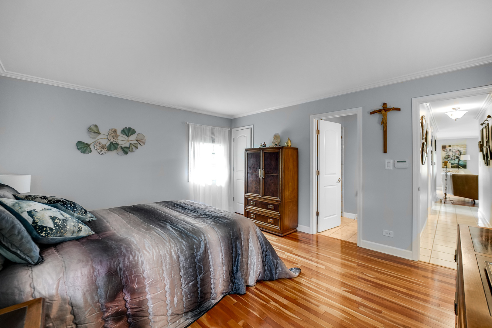 920 Harrison Lane Hoffman Estates, IL 60192 - Photo 12 of 26 a bedroom with a bed and a flat screen tv
