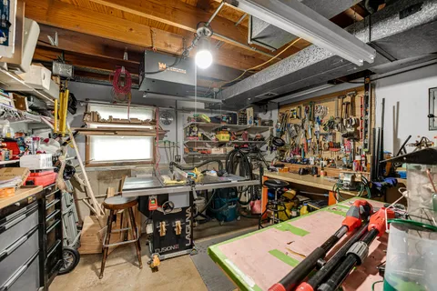 a view of a storage room with wooden floor