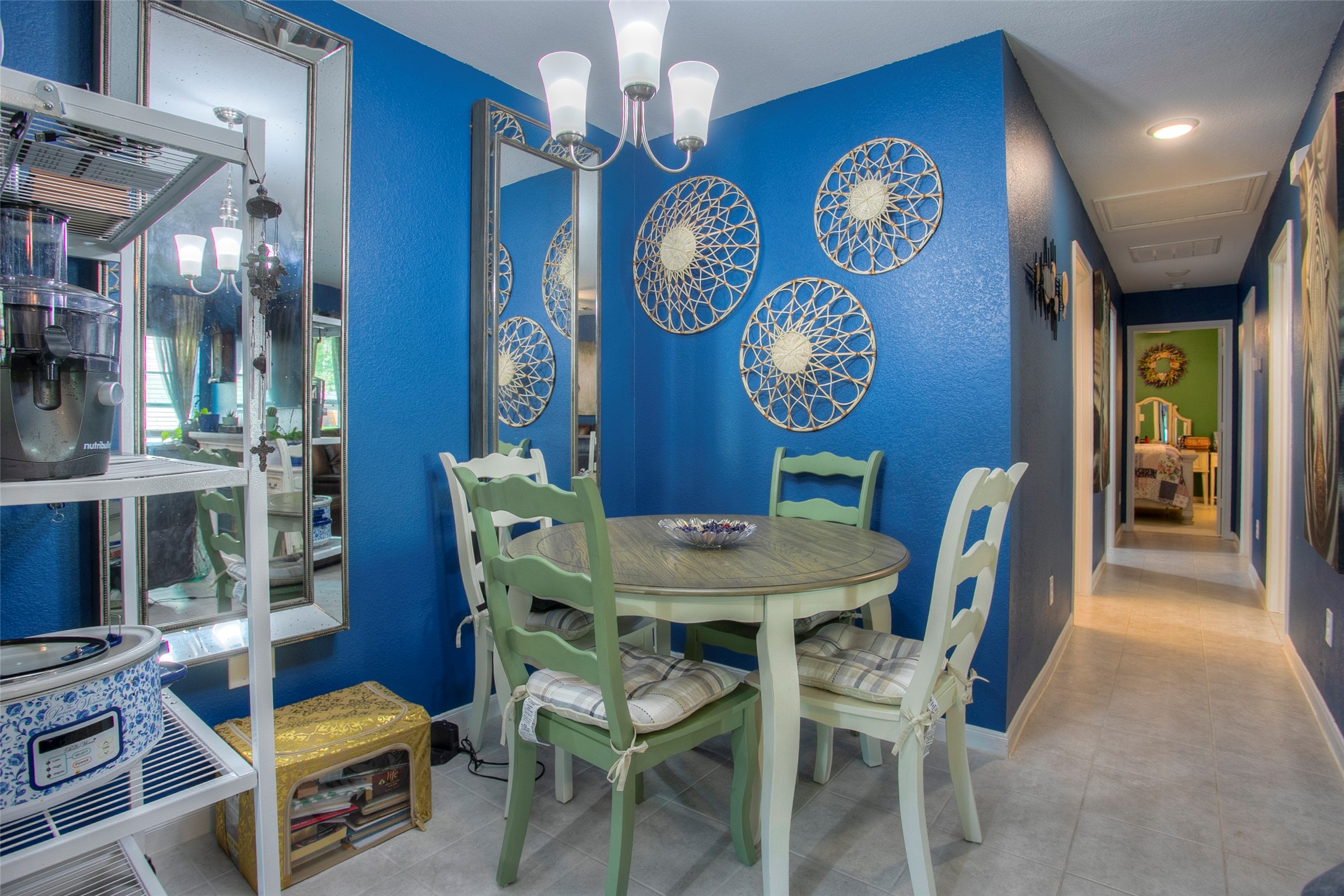 28617 Rantoul Court Point Blank, TX 77364 - Photo 14 of 29 a view of a dining room with furniture and a chandelier