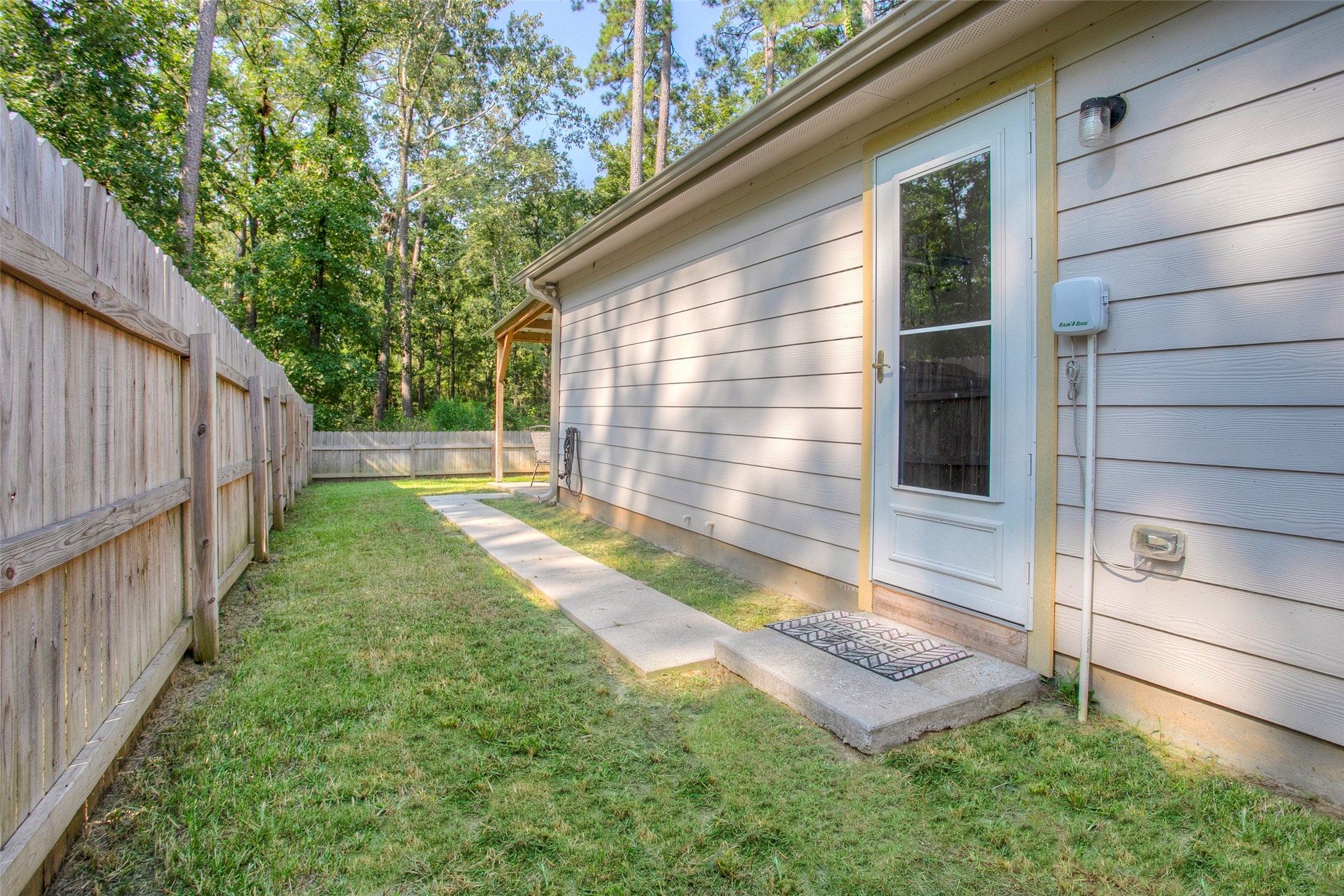 28617 Rantoul Court Point Blank, TX 77364 - Photo 27 of 29 a view of a small yard front of house