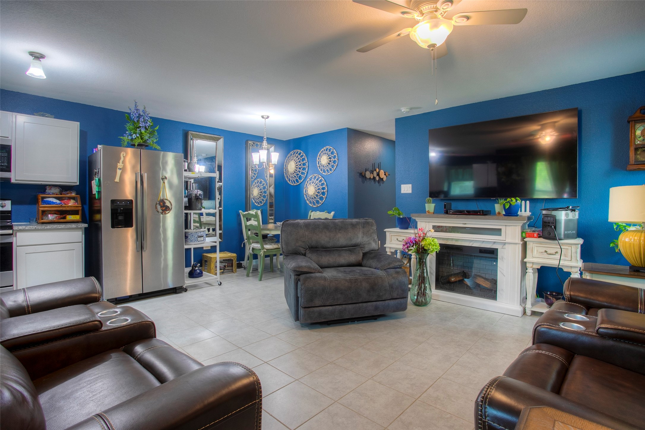 28617 Rantoul Court Point Blank, TX 77364 - Photo 7 of 29 a living room with furniture and a flat screen tv