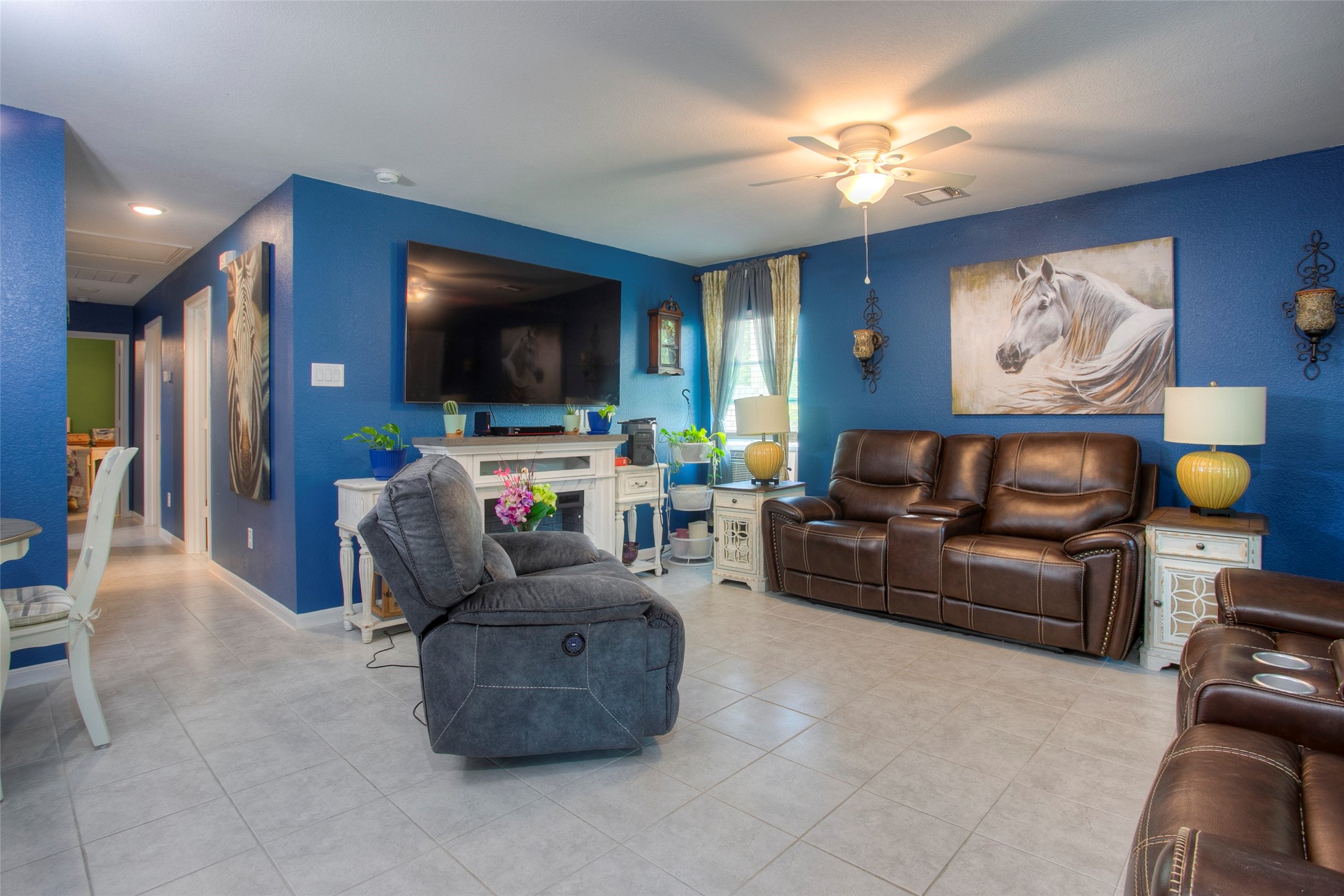 28617 Rantoul Court Point Blank, TX 77364 - Photo 8 of 29 a living room with furniture and a flat screen tv
