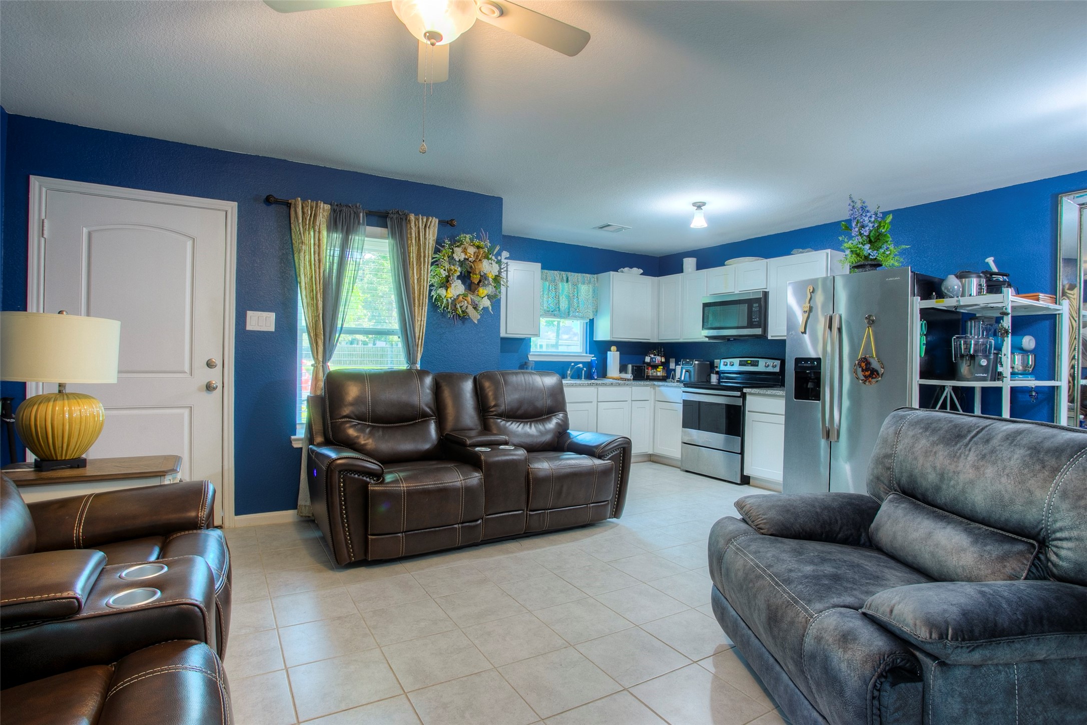 28617 Rantoul Court Point Blank, TX 77364 - Photo 10 of 29 a living room with furniture and a large window