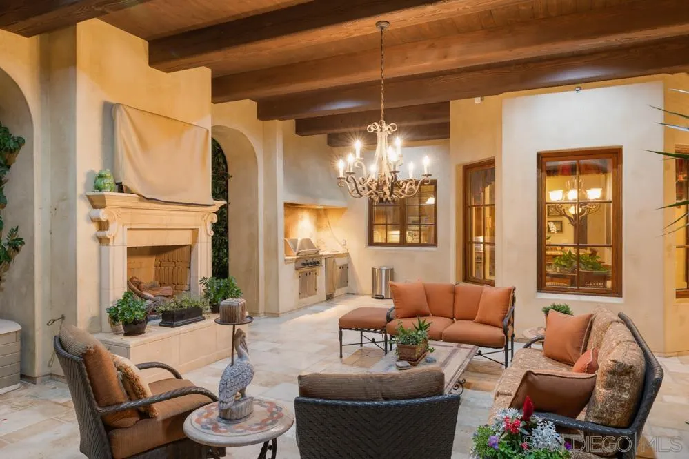 16537 Rd To Rio San Diego, CA 92127 - Photo 27 of 30 a living room with furniture and a chandelier