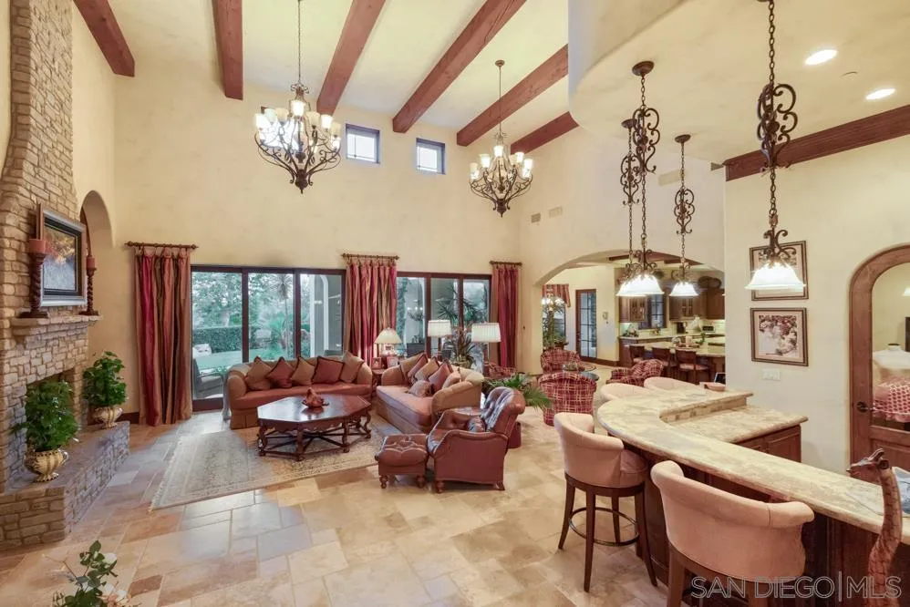 16537 Rd To Rio San Diego, CA 92127 - Photo 7 of 30 a living room with patio fireplace furniture and a large window
