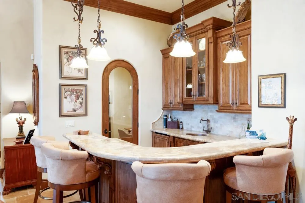 16537 Rd To Rio San Diego, CA 92127 - Photo 10 of 30 a room with granite countertop a sink and a dining table