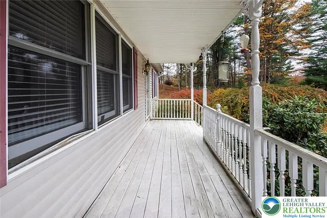 a kitchen with stainless steel appliances a stove a sink and a refrigerator