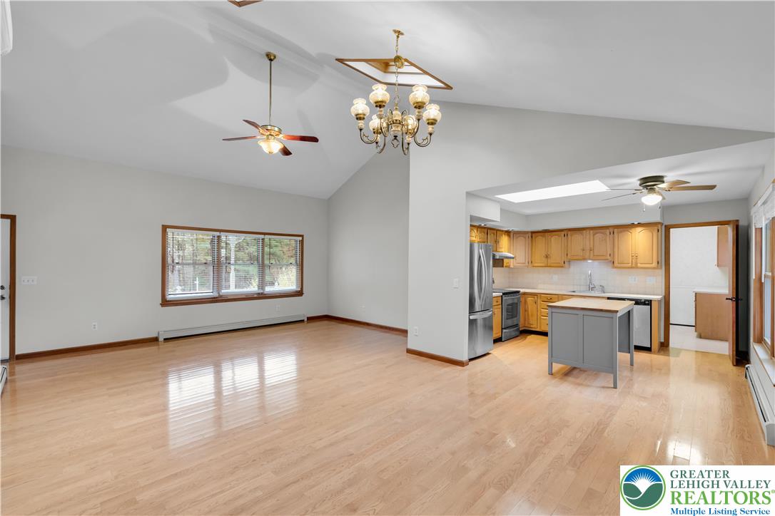 139 Johnny Bee Road Dingmans Ferry, PA 18328 - Photo 20 of 51 a view of a room with a window and wooden floor