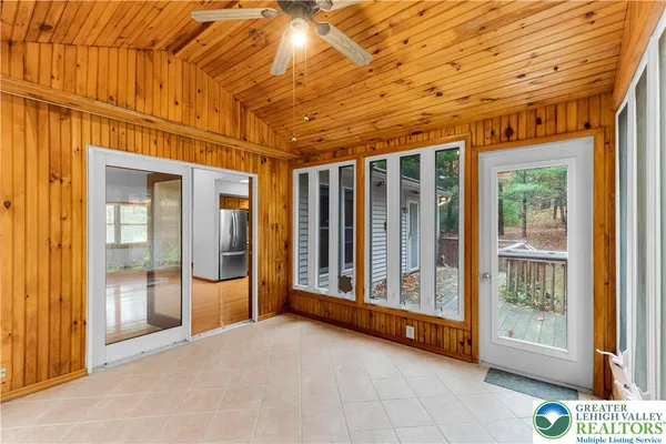 a bathroom with a shower and a tub