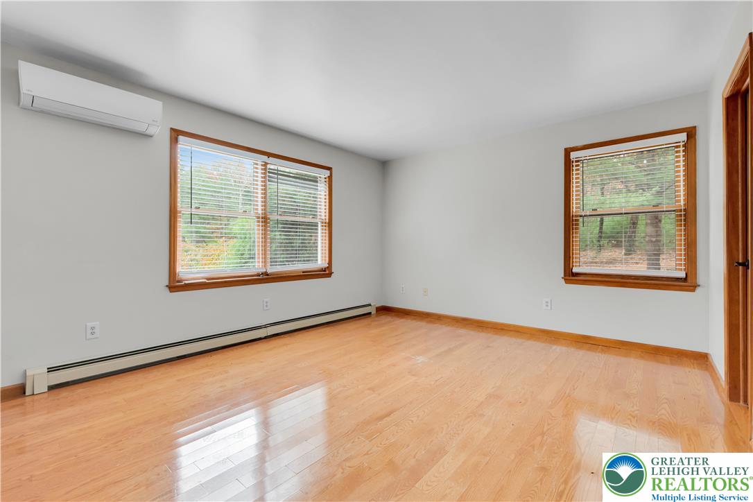 139 Johnny Bee Road Dingmans Ferry, PA 18328 - Photo 30 of 51 an empty room with windows