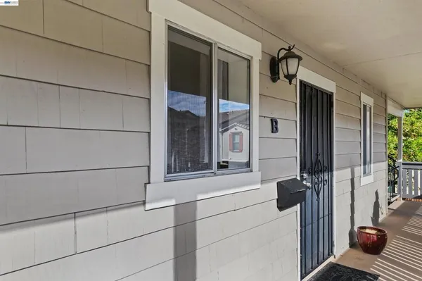 a view of a balcony with door