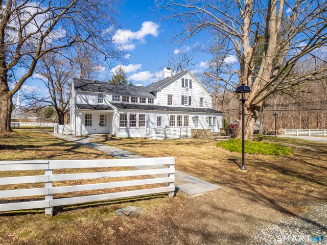 a view of a house with a swimming pool