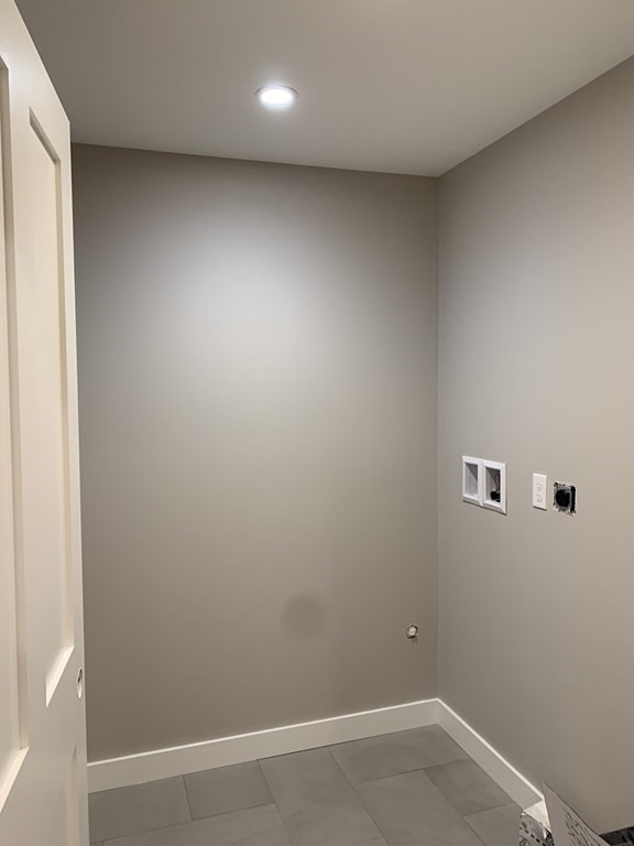 18 White Loaf Road Southampton, MA 01073 - Photo 18 of 20 an empty room with a workbench