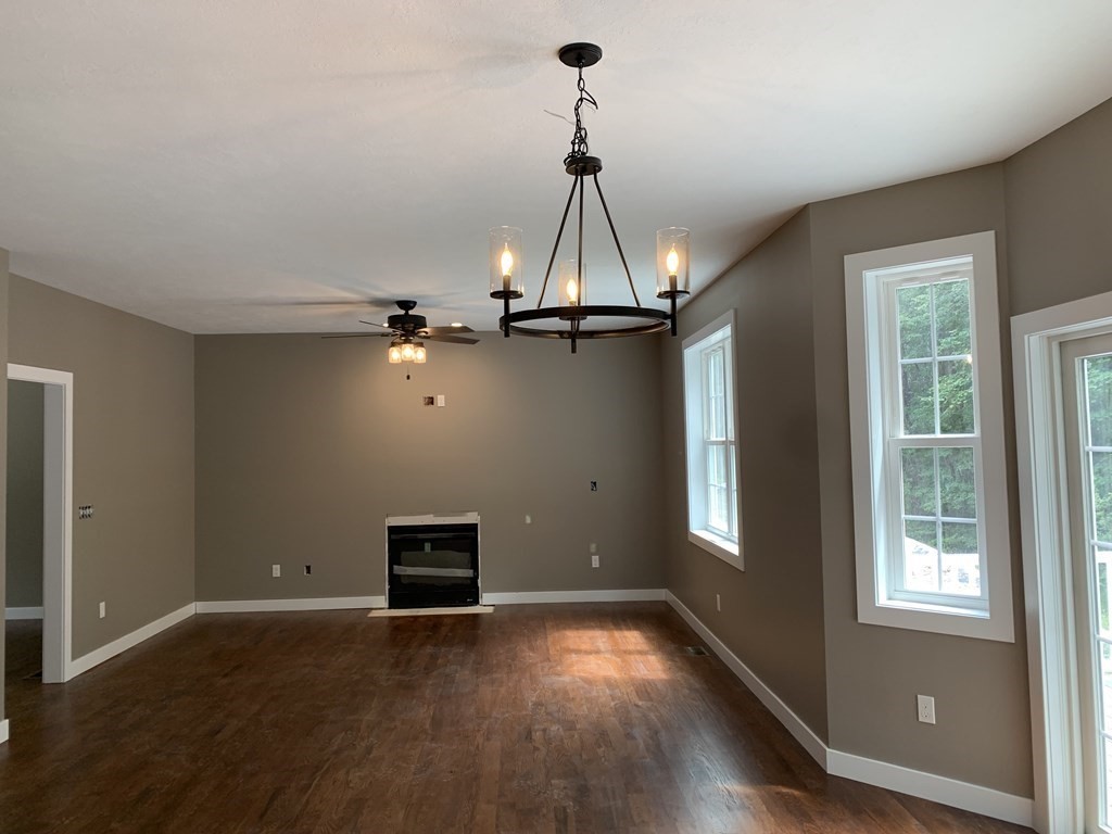 18 White Loaf Road Southampton, MA 01073 - Photo 7 of 20 a view of a livingroom with a ceiling fan and window