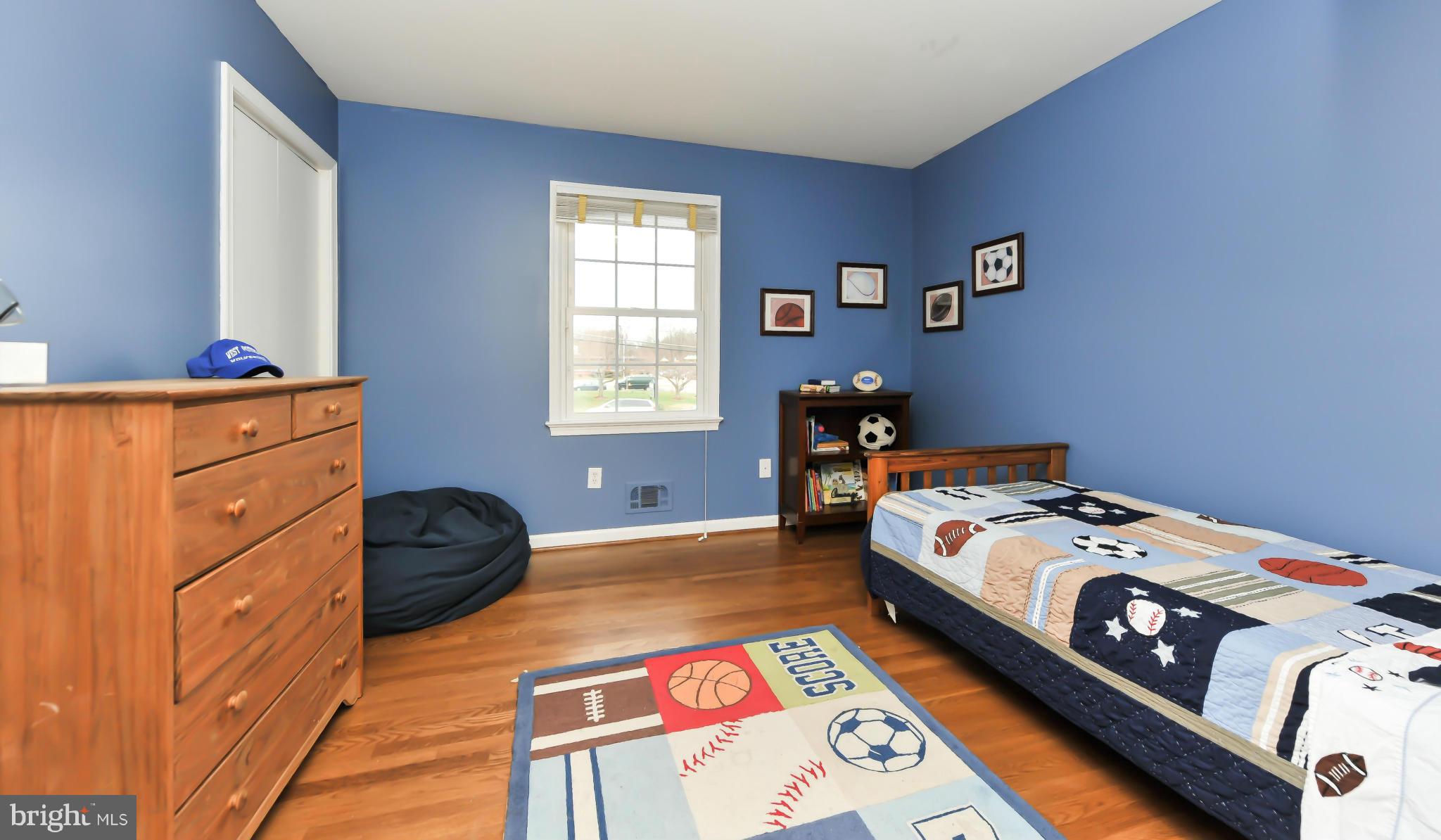 8417 Riverside Road Alexandria, VA 22308 - Photo 13 of 30 a bedroom with a bed and a window
