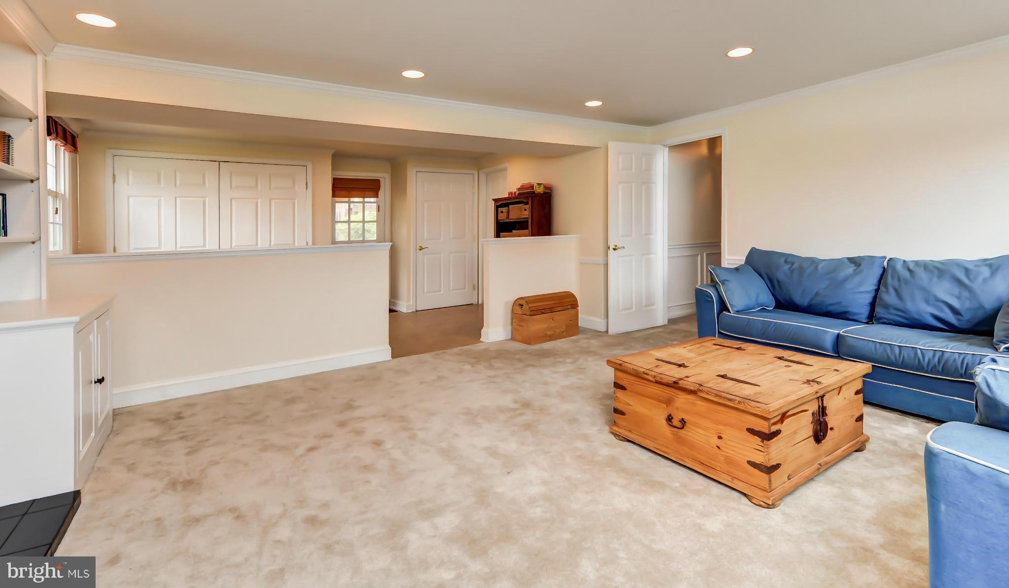 8417 Riverside Road Alexandria, VA 22308 - Photo 22 of 30 a living room with furniture and a couch