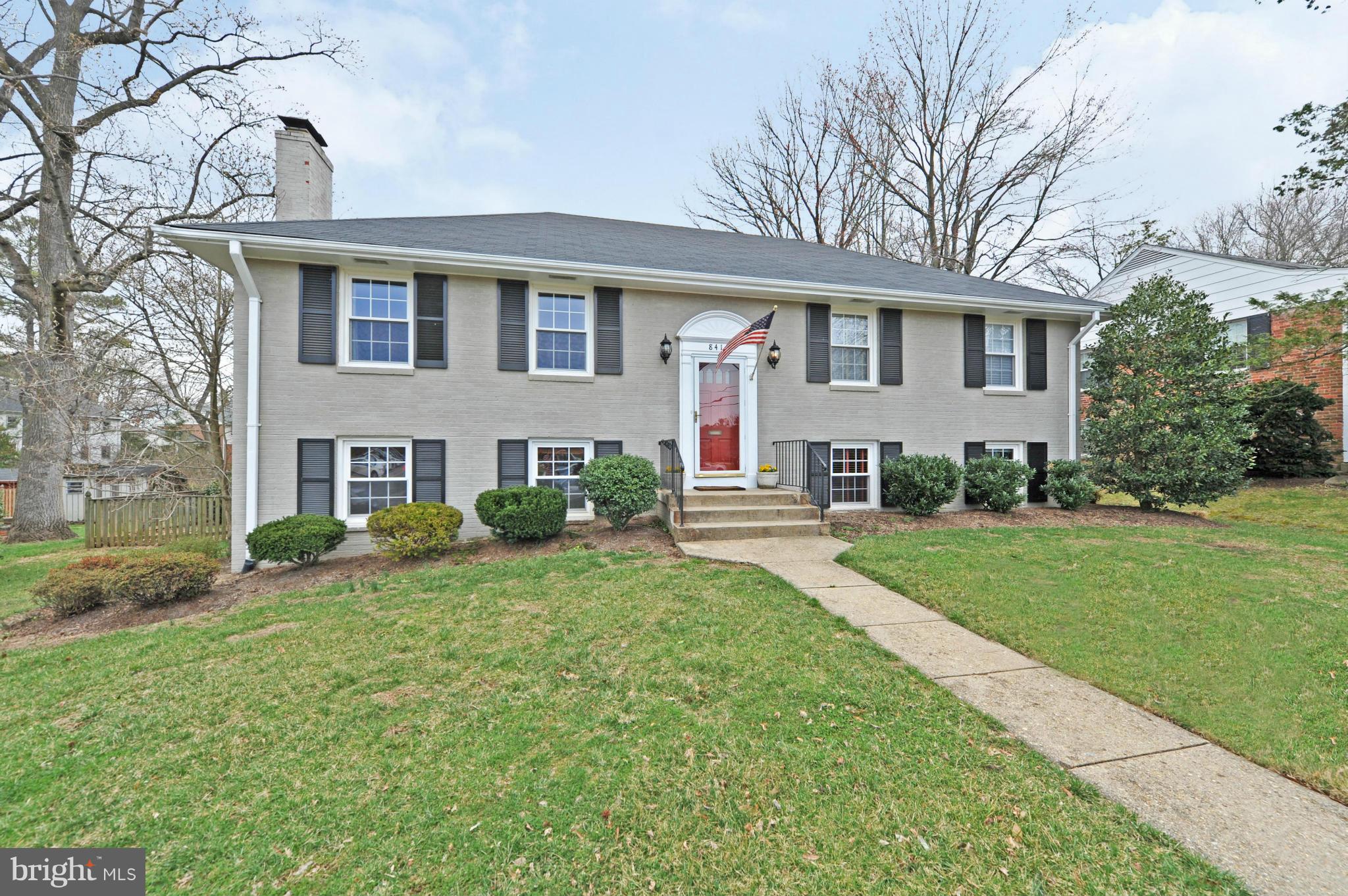 8417 Riverside Road Alexandria, VA 22308 - Photo 30 of 30 a front view of a house with a yard