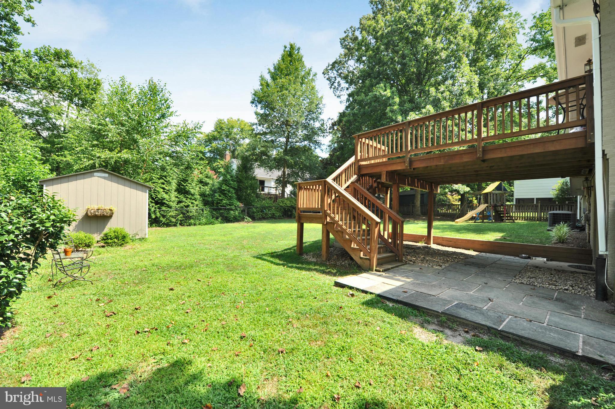 8417 Riverside Road Alexandria, VA 22308 - Photo 5 of 30 a view of a house with a yard