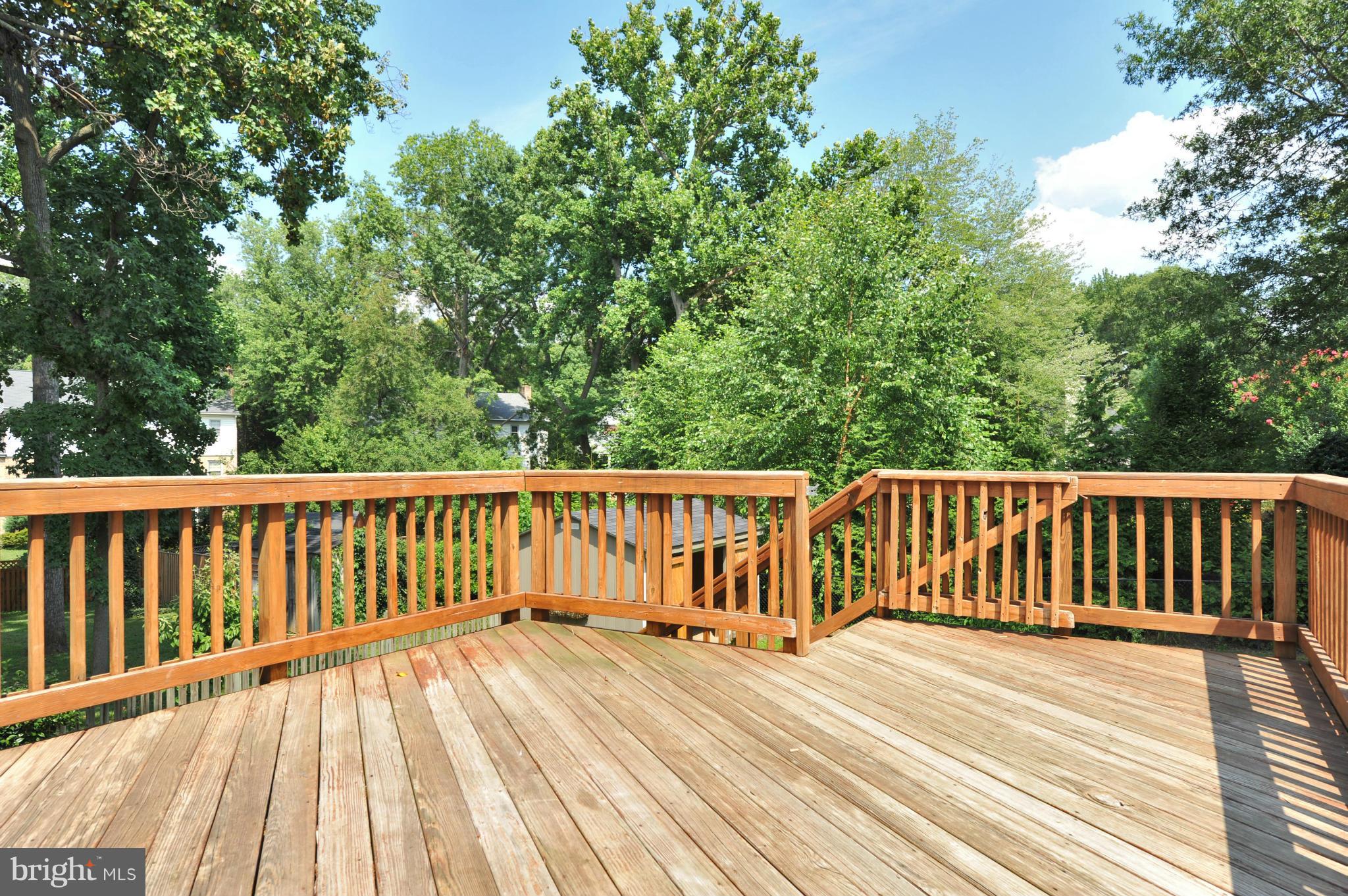 8417 Riverside Road Alexandria, VA 22308 - Photo 6 of 30 a view of deck with wooden floor and fence