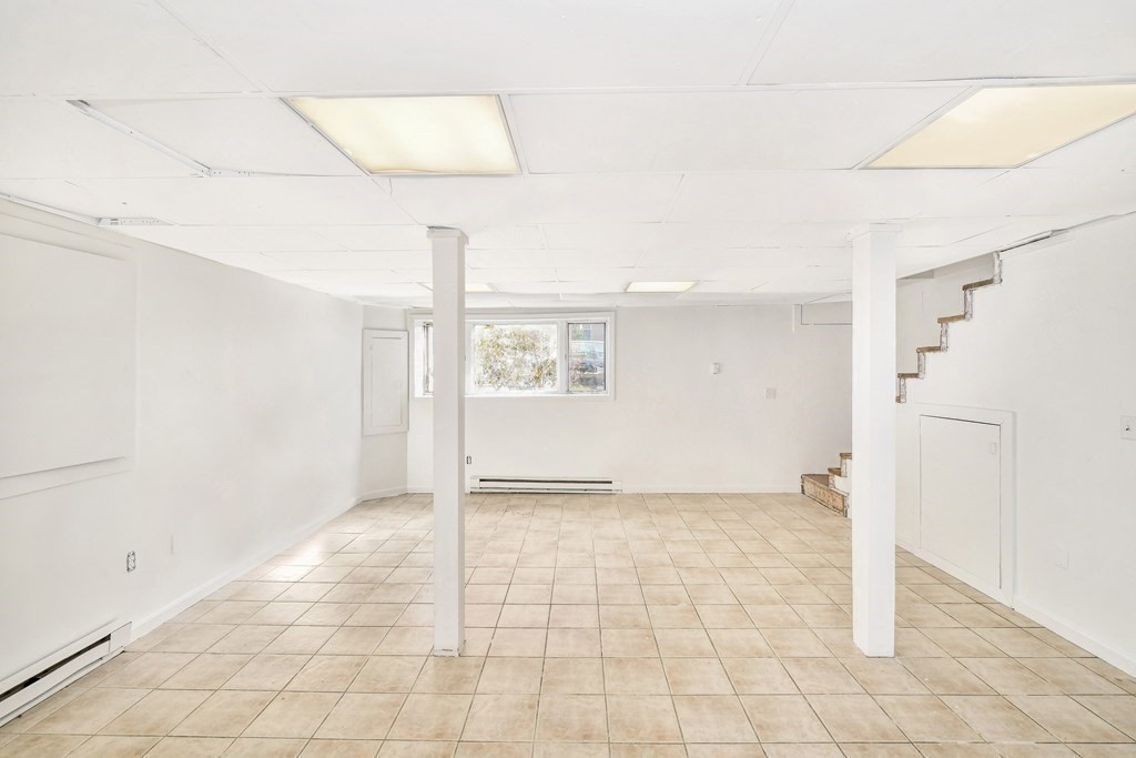 68 Marginal Street, Unit A Boston, MA 02128 - Photo 11 of 21 a view of an empty room with a window
