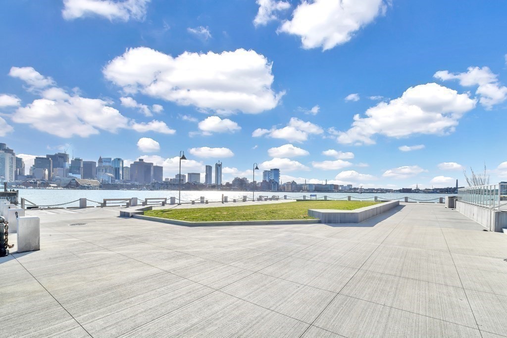 68 Marginal Street, Unit A Boston, MA 02128 - Photo 21 of 21 a view of a swimming pool and a yard