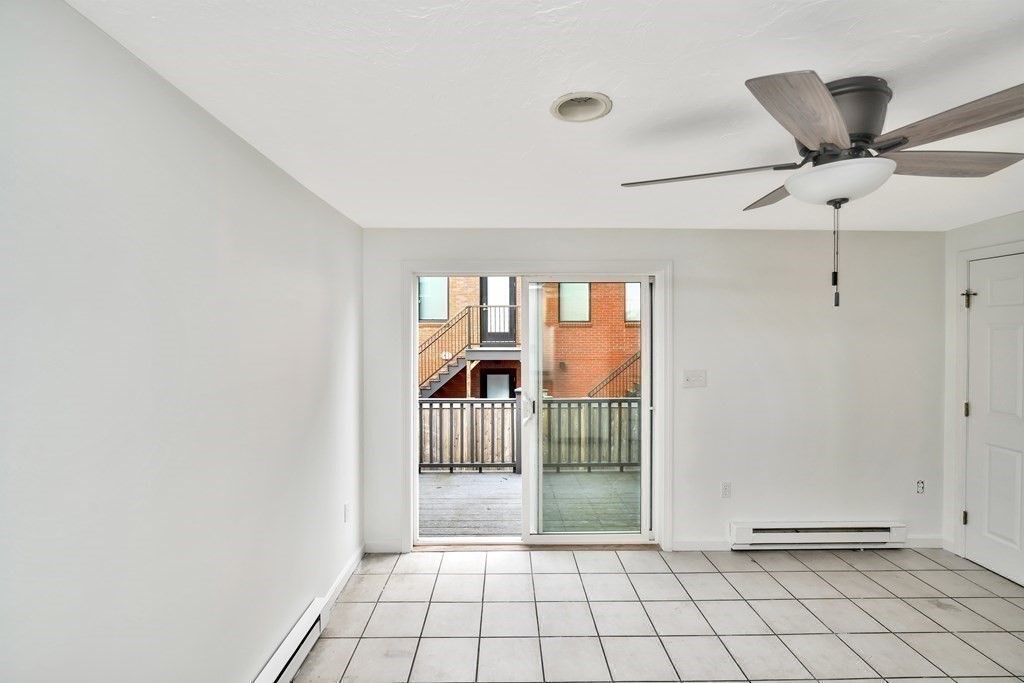 68 Marginal Street, Unit A Boston, MA 02128 - Photo 5 of 21 a view of an empty room and window