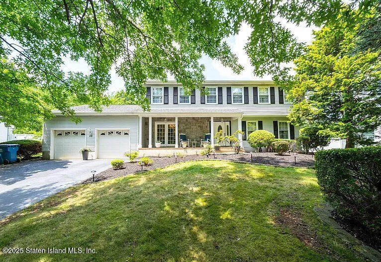 29 Chatham Ridge Drive Freehold, NJ 07728 - Photo 1 of 1 a front view of a house with swimming pool and furniture