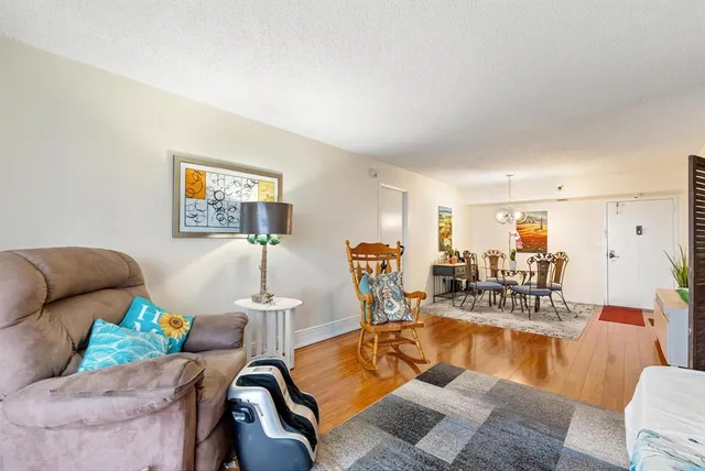 a view of a balcony with wooden floor