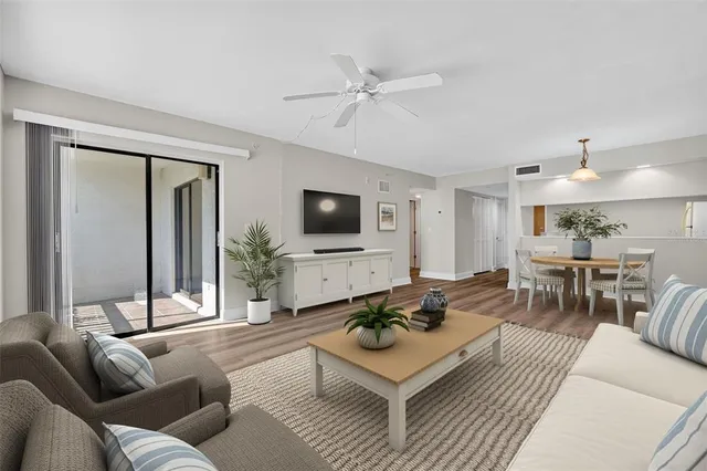 a view of an empty room and wooden floor