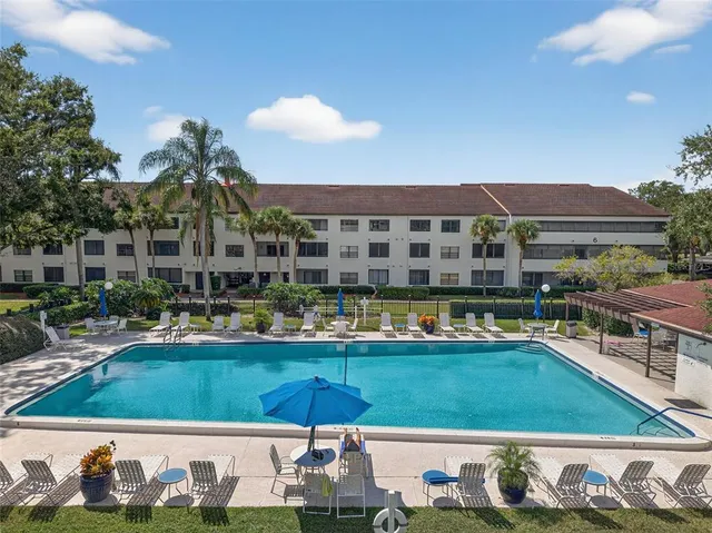 an aerial view of residential houses and city street