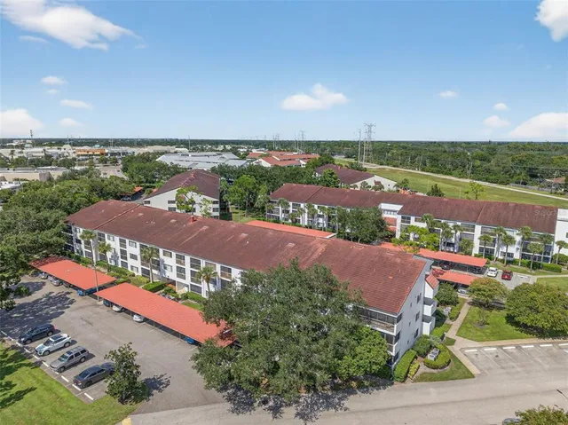an aerial view of residential houses and city street