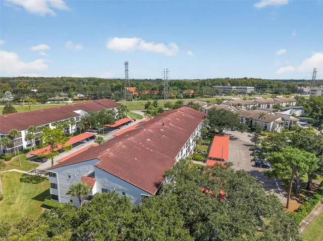an aerial view of residential houses and city view