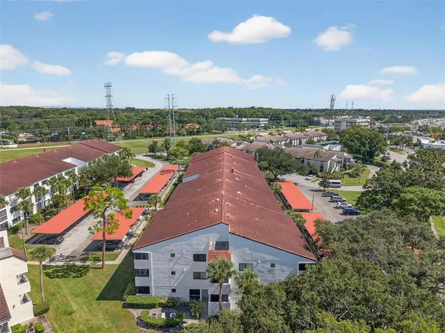 a large building with a garden view