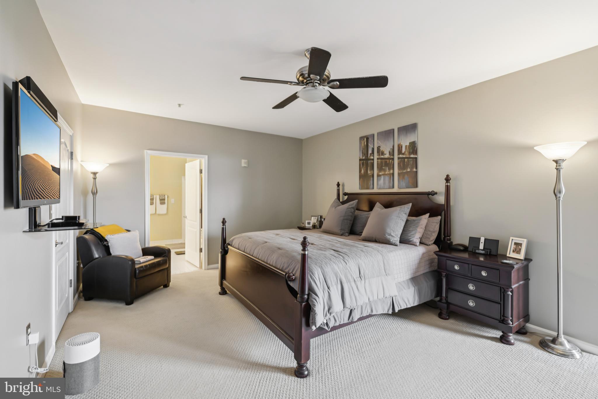 1621 Ladue Court, Unit 207 Woodbridge, VA 22191 - Photo 16 of 33 a spacious bedroom with a bed and ceiling fan