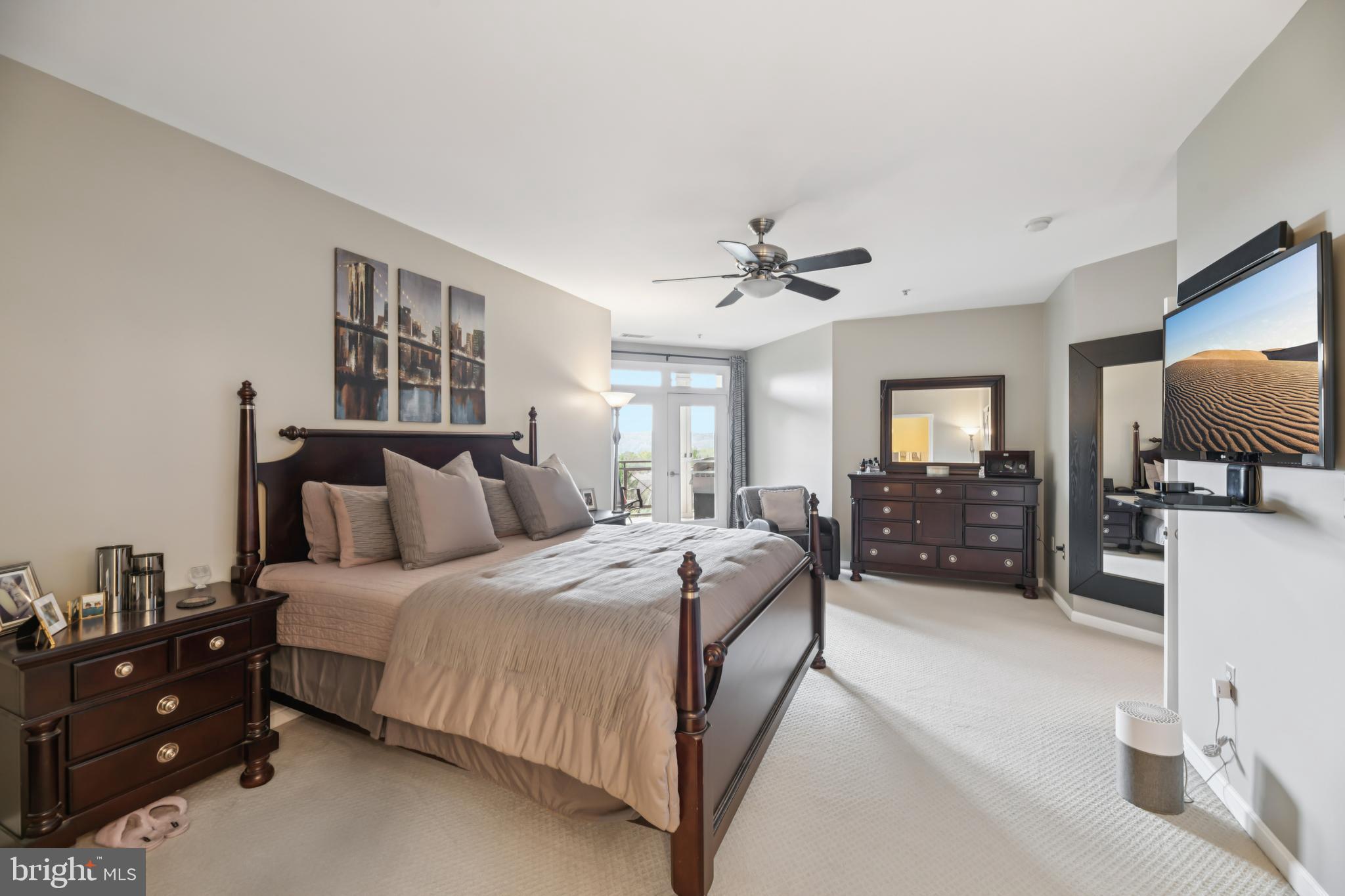 1621 Ladue Court, Unit 207 Woodbridge, VA 22191 - Photo 18 of 33 a bed room with a bed window and a television