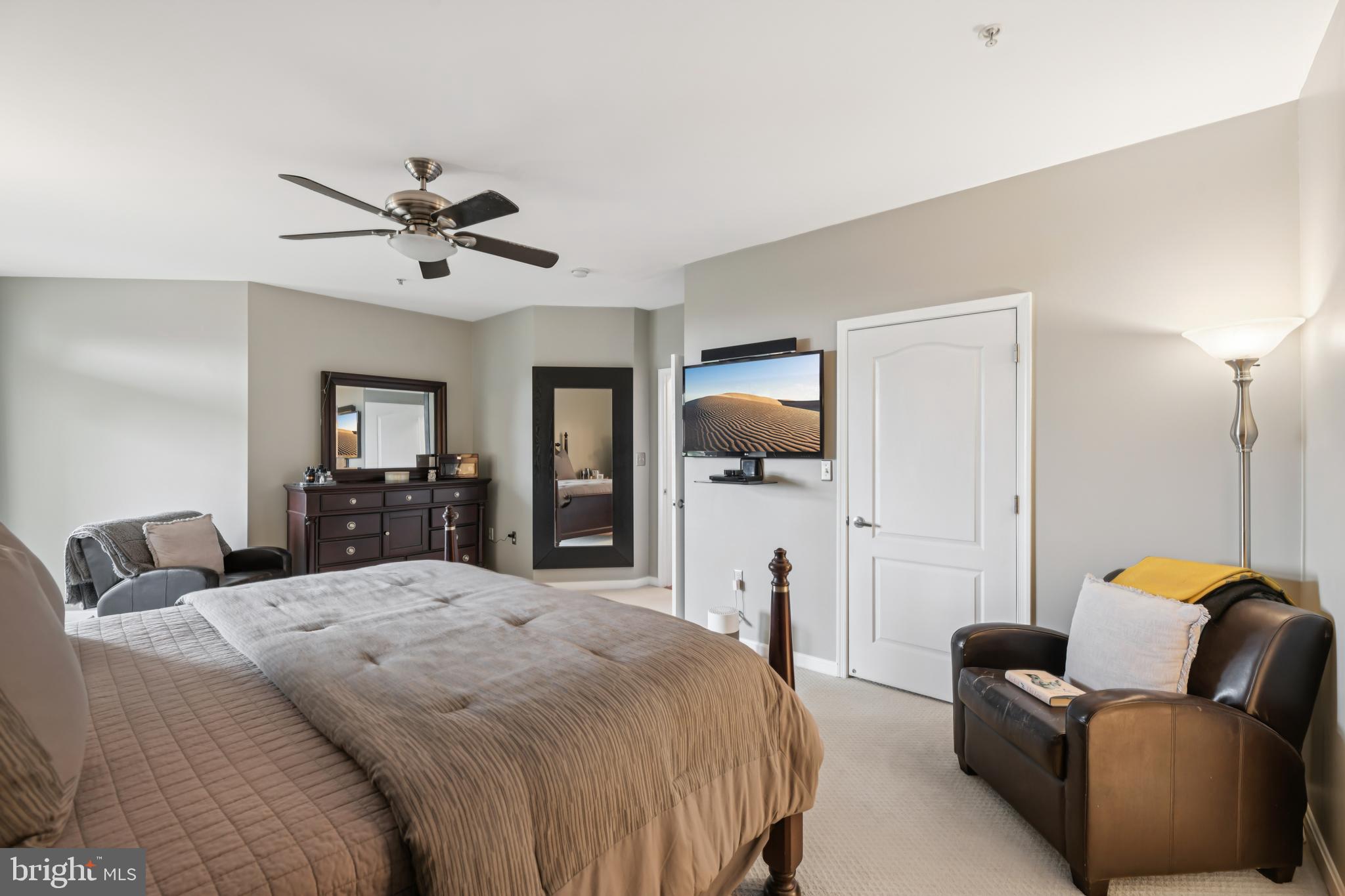 1621 Ladue Court, Unit 207 Woodbridge, VA 22191 - Photo 19 of 33 a bedroom with a bed and wooden floor