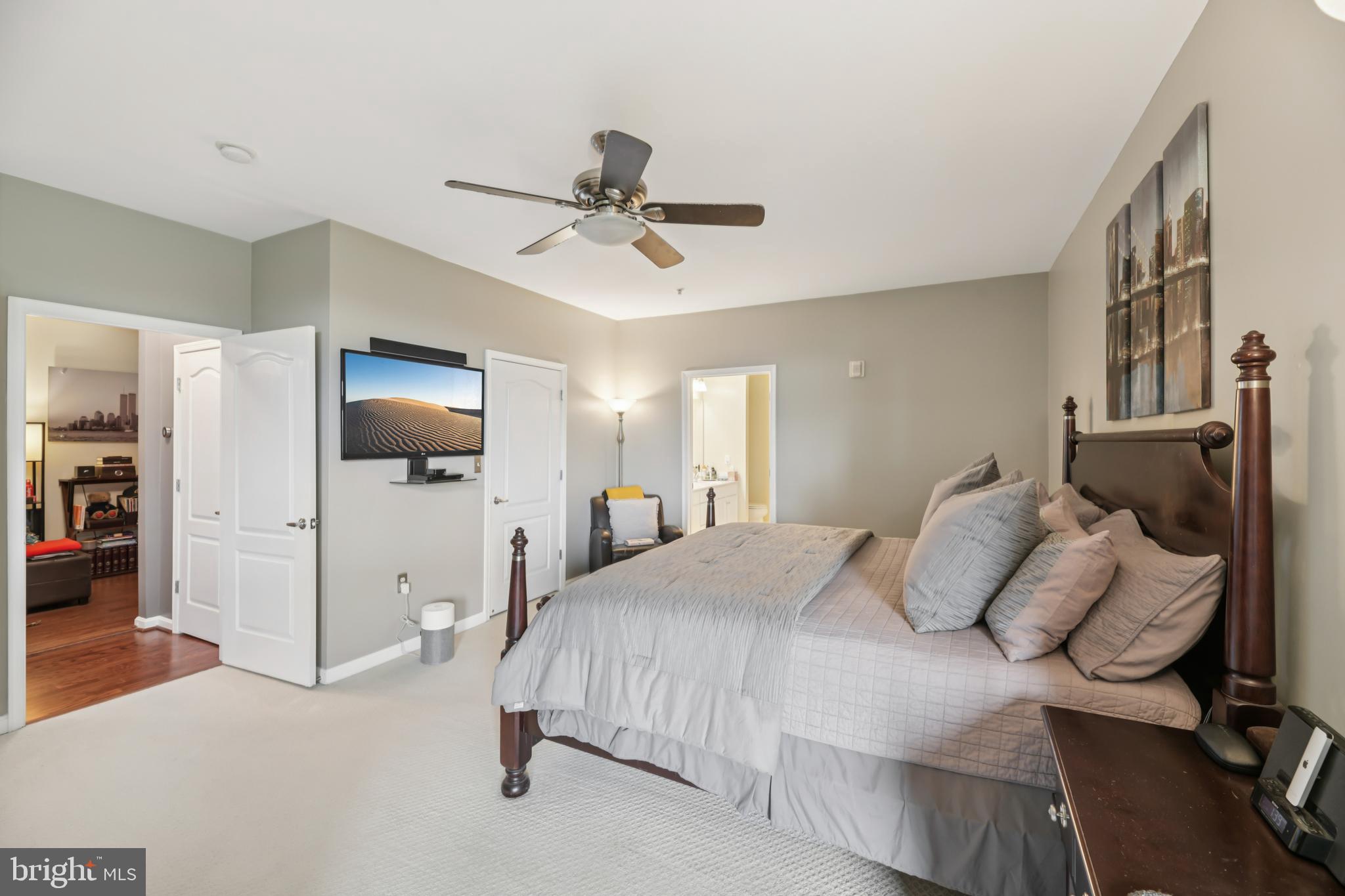 1621 Ladue Court, Unit 207 Woodbridge, VA 22191 - Photo 20 of 33 a bedroom with a bed and a flat tv screen on the dresser
