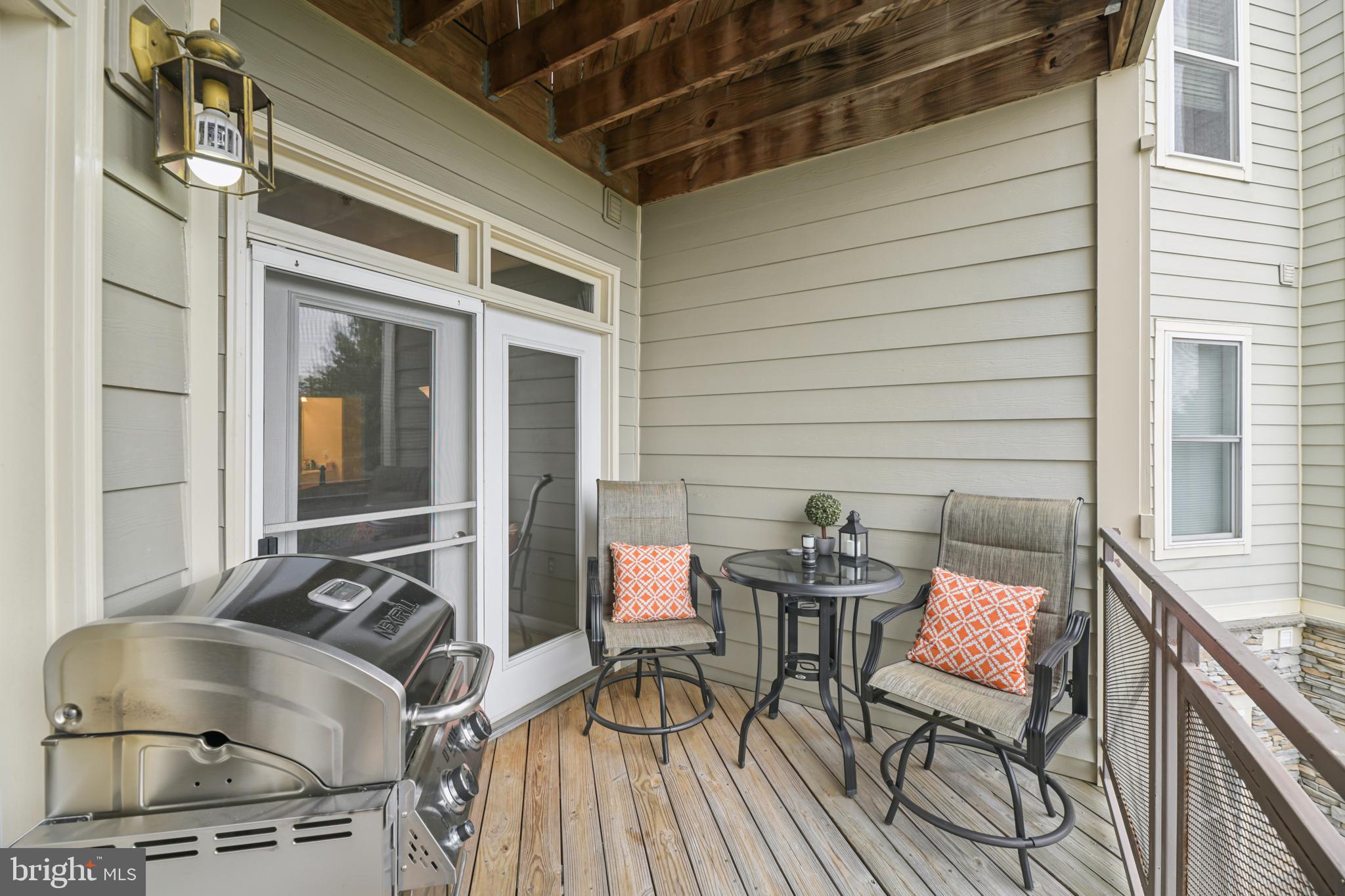 1621 Ladue Court, Unit 207 Woodbridge, VA 22191 - Photo 28 of 33 a view of a chairs and table in the balcony