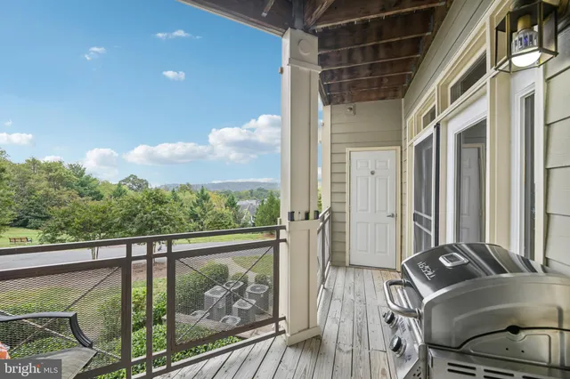 a view of balcony and wooden floor