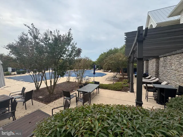 a view of a terrace with sitting area