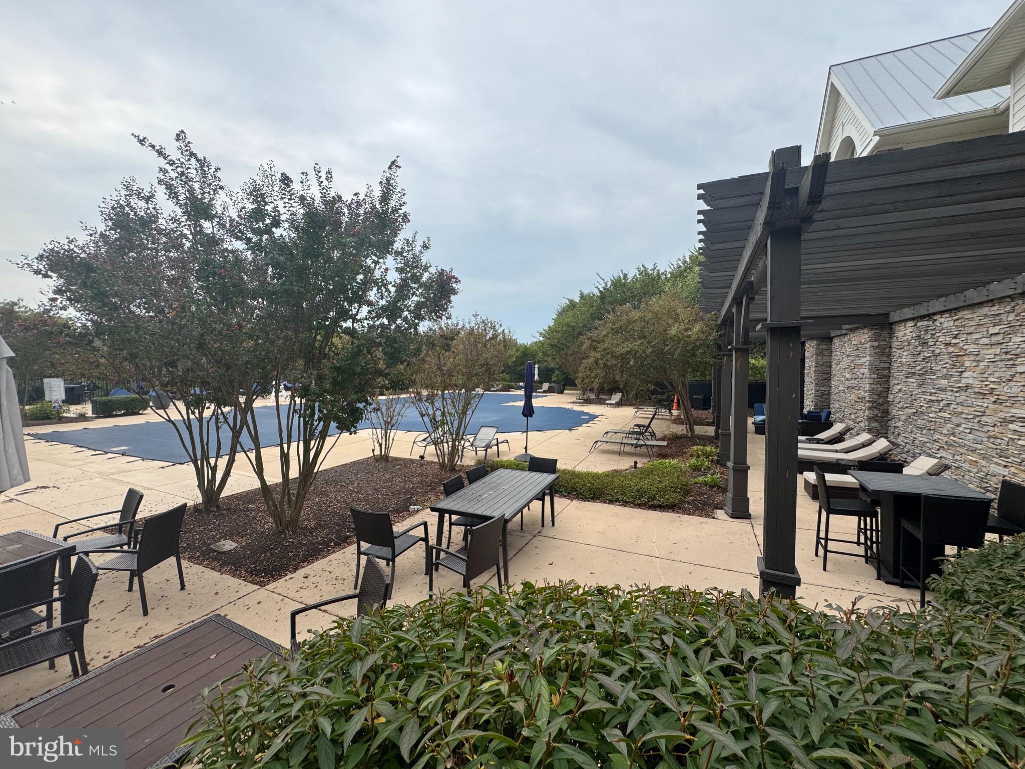 1621 Ladue Court, Unit 207 Woodbridge, VA 22191 - Photo 30 of 33 a view of a terrace with sitting area