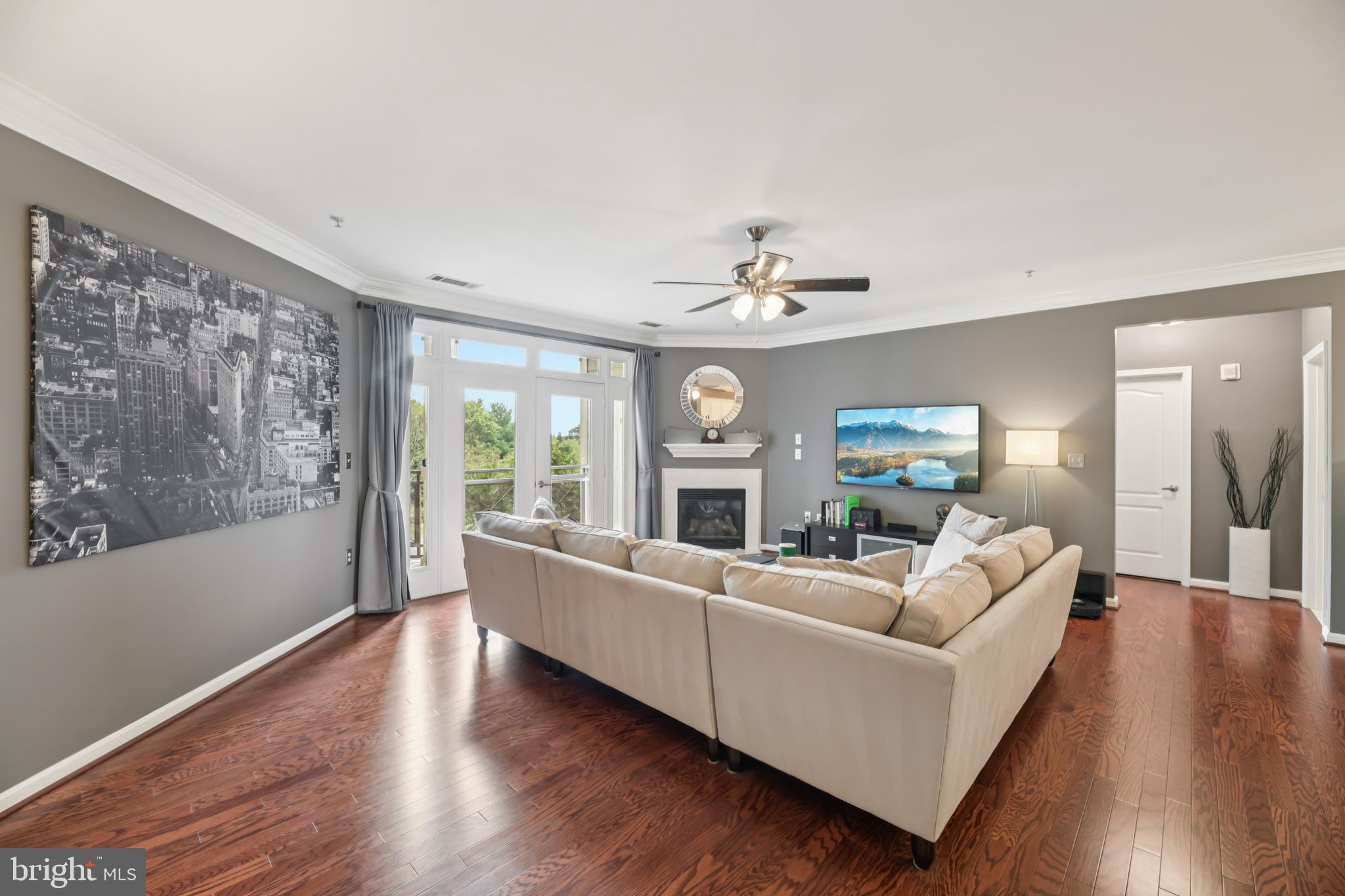 1621 Ladue Court, Unit 207 Woodbridge, VA 22191 - Photo 3 of 33 a living room with furniture and a large window