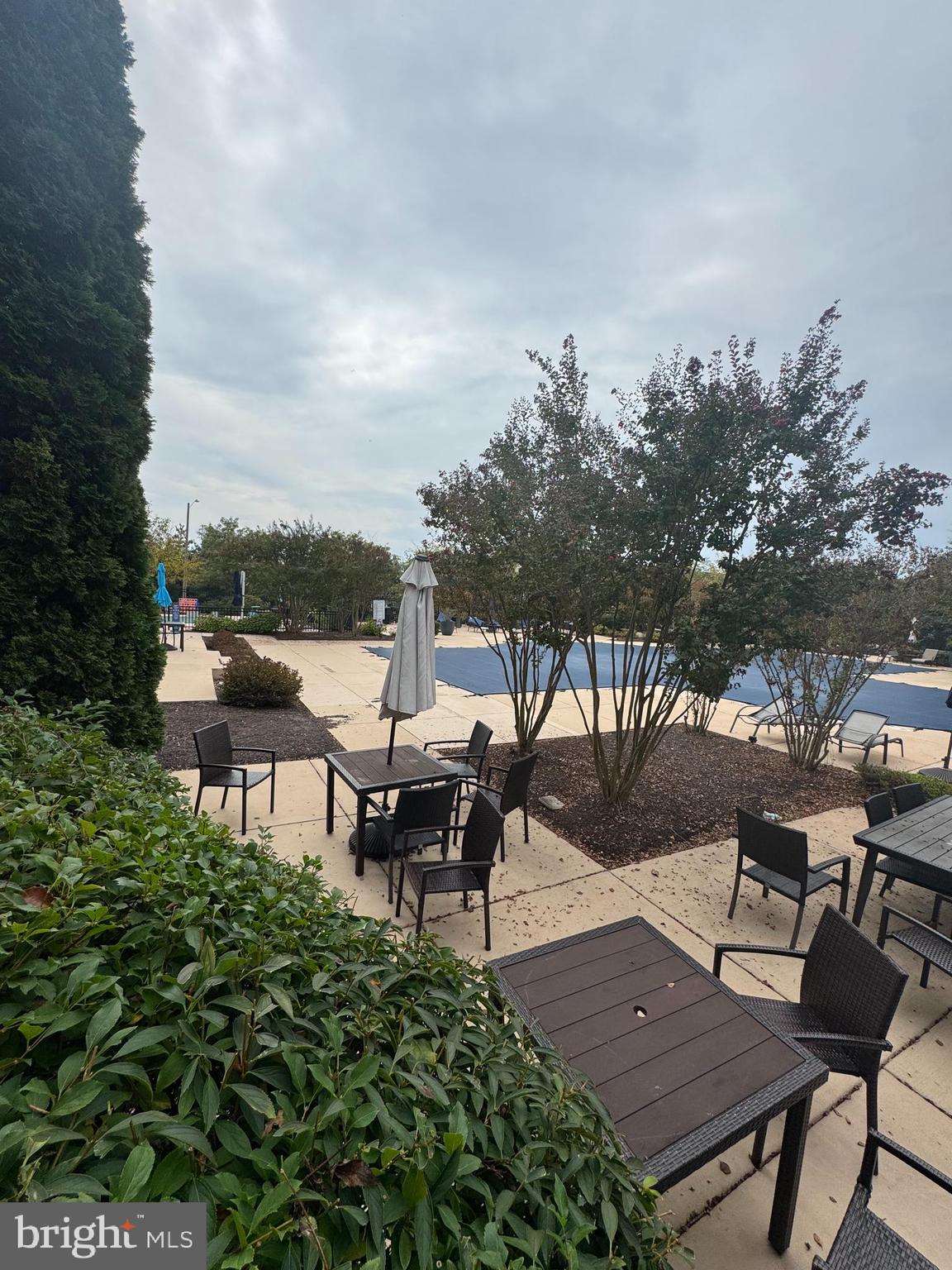 1621 Ladue Court, Unit 207 Woodbridge, VA 22191 - Photo 31 of 33 a view of a backyard with sitting area