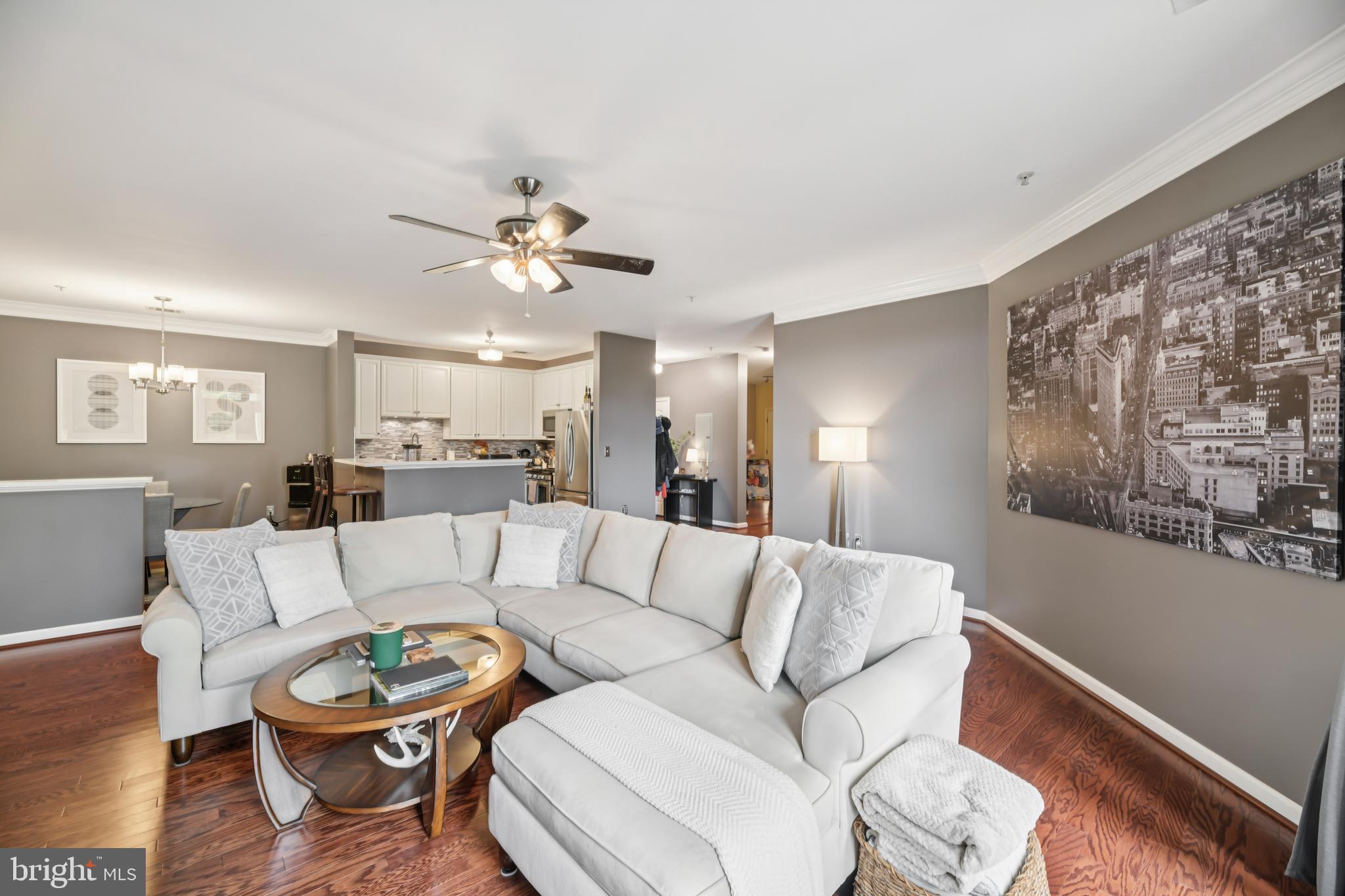 1621 Ladue Court, Unit 207 Woodbridge, VA 22191 - Photo 5 of 33 a living room with furniture and a large window