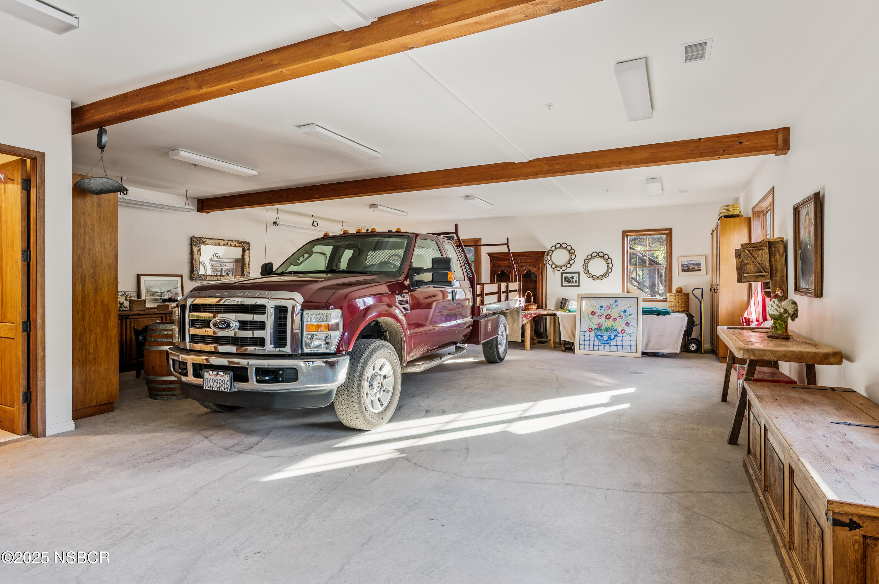4086 East Oak Trail Road Santa Ynez, CA 93460 - Photo 39 of 57 a car parked in garage