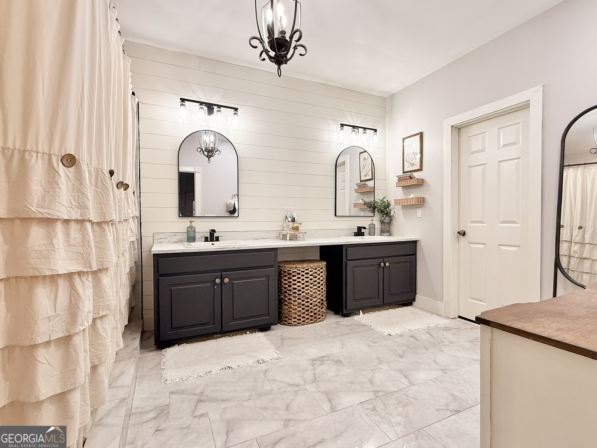 919 West Milner Road Concord, GA 30206 - Photo 25 of 40 a bathroom with a sink vanity and mirror