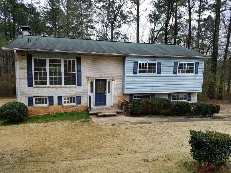 3902 Wake Forest Road Decatur, GA 30034 - Photo 1 of 1 a front view of a house with a yard