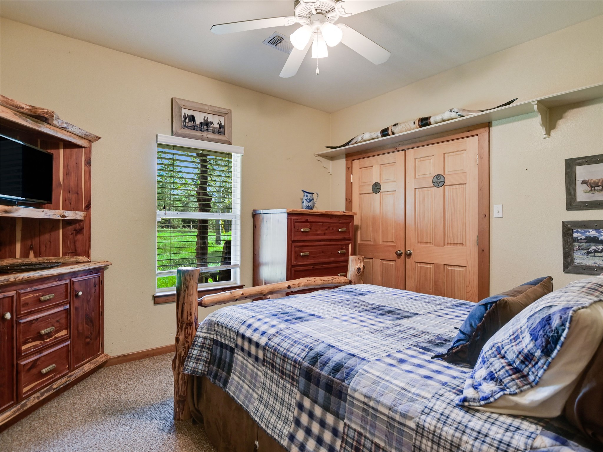 762 Karisch Road Smithville, TX 78957 - Photo 15 of 40 a bedroom with a bed and furniture