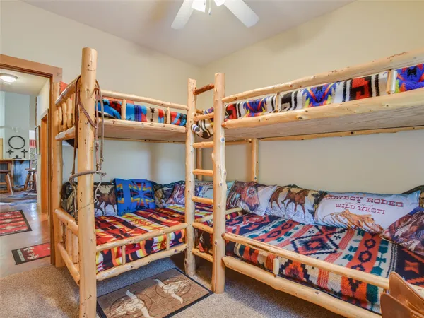 a view of a backyard with sitting area